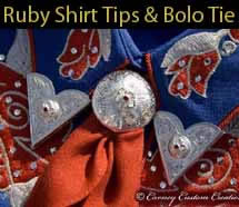 Custom made ruby shirt tips and bolo tie.